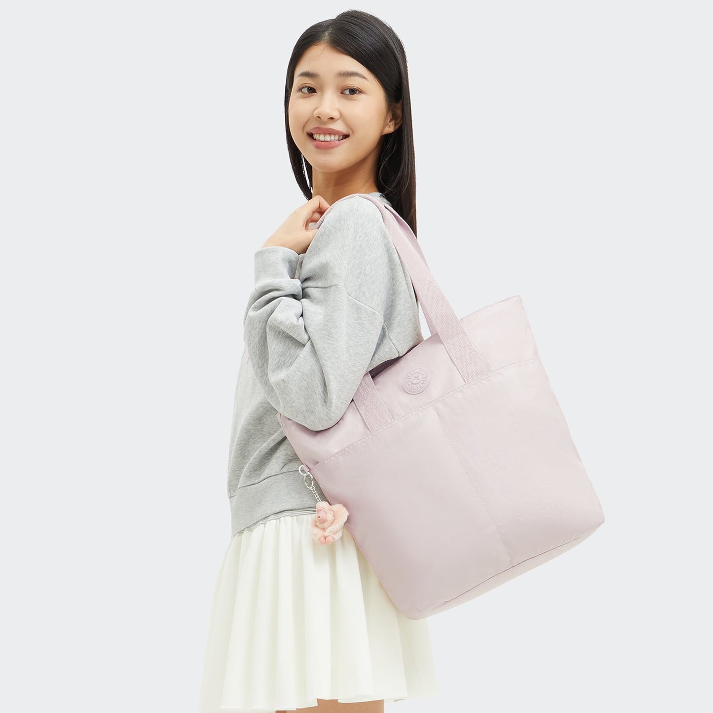 Kipling Hanifa pink shine