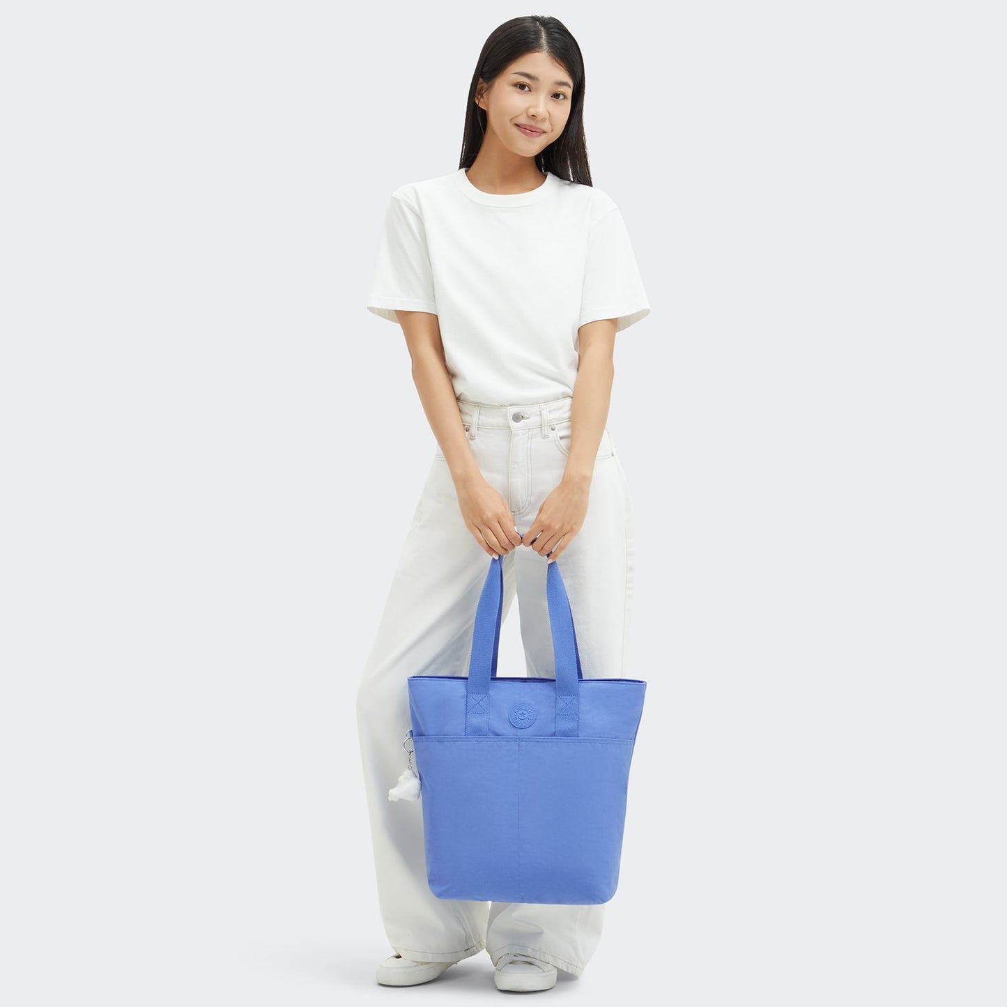 Kipling Hanifa cocktail blue