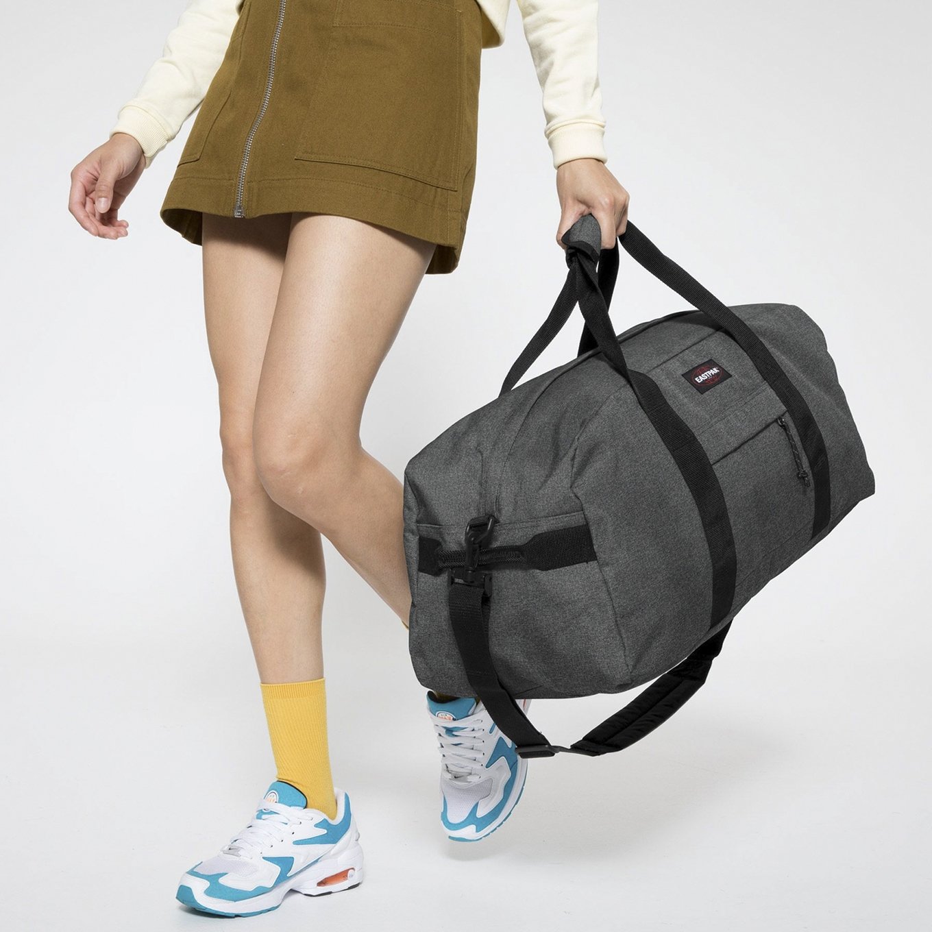 Eastpak Station Reistas + black denim