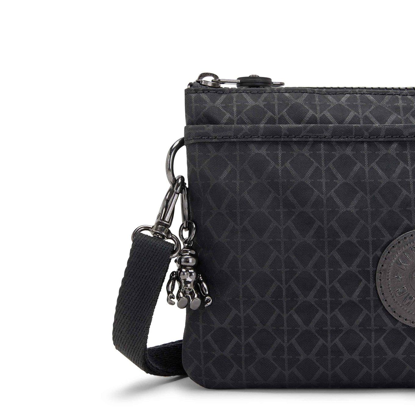 Kipling Riri signature emb