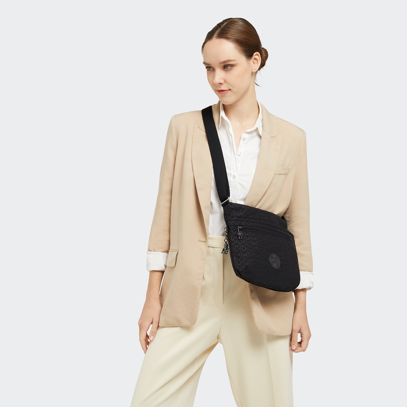 Kipling Arto signature emb