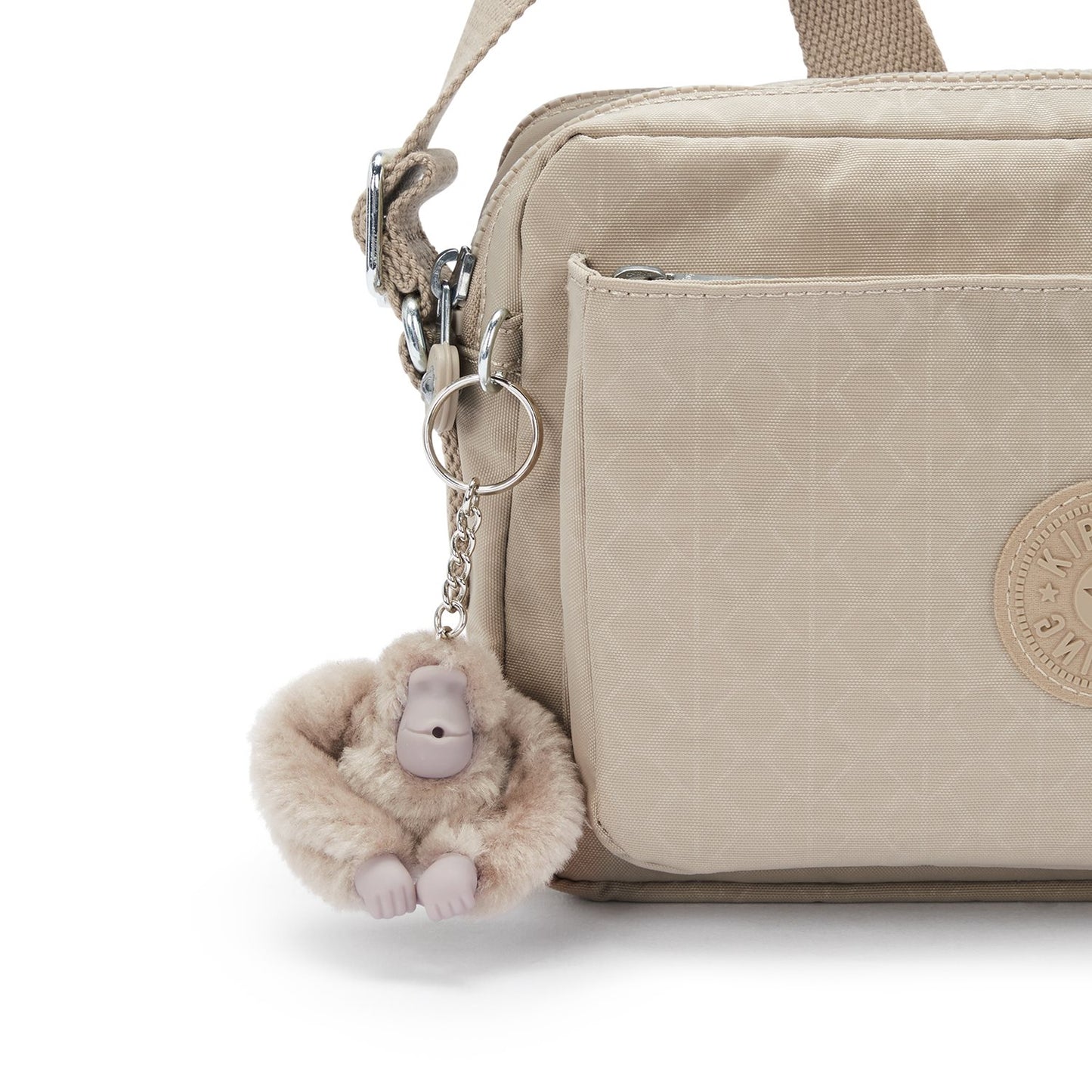 Kipling Abanu M sign beige emb