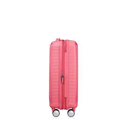 American Tourister Soundbox Spinner 55 Erweiterbarer, sonnengeküsster Koralle-Hartschalenkoffer