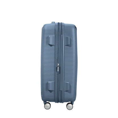 American Tourister Soundbox Spinner 67 Erweiterbarer steinblauer Hartschalenkoffer