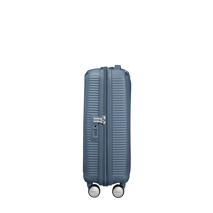 American Tourister Soundbox Spinner 55 Erweiterbares steinblaues Hartschalenetui