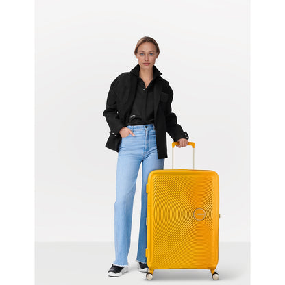 American Tourister Soundbox Spinner 67 Erweiterbares goldgelbes Hartschalenetui
