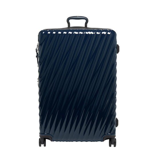 Tumi 19 Degree Extended Trip erweiterbarer 4-Rad-Trolley, marineblauer Hartschalenkoffer