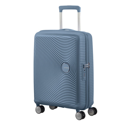 American Tourister Soundbox Spinner 55 Erweiterbares steinblaues Hartschalenetui