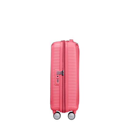 American Tourister Soundbox Spinner 55 Erweiterbarer, sonnengeküsster Koralle-Hartschalenkoffer